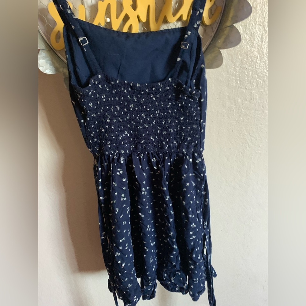 Cute mini dress perfect with some white high top vans